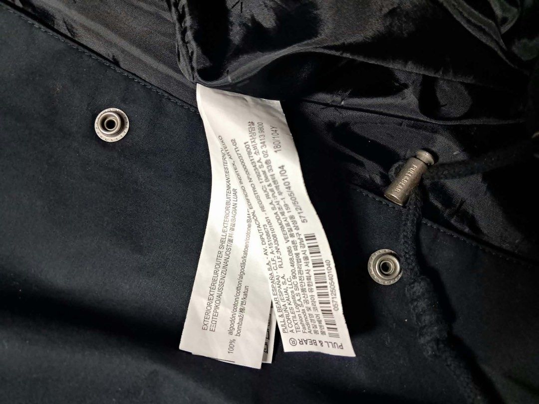 Pull and Bear Black Coach Jacket Size M (Category: Coats, Jackets and Outerwear) located in Baguio. Submitted by padisellsz (Listing ID 1465459087, Image 2). Description: - Brand: Pull & Bear - Very good condition - No issues - Style: Black longline coach jacket - Size: Medium - Measurements: 22" width x 33" length x 27" sleeve - Material: 100% cotton outer shell - Features: Button-up front, classic collar, ribbed cuffs, and adjustable drawstring