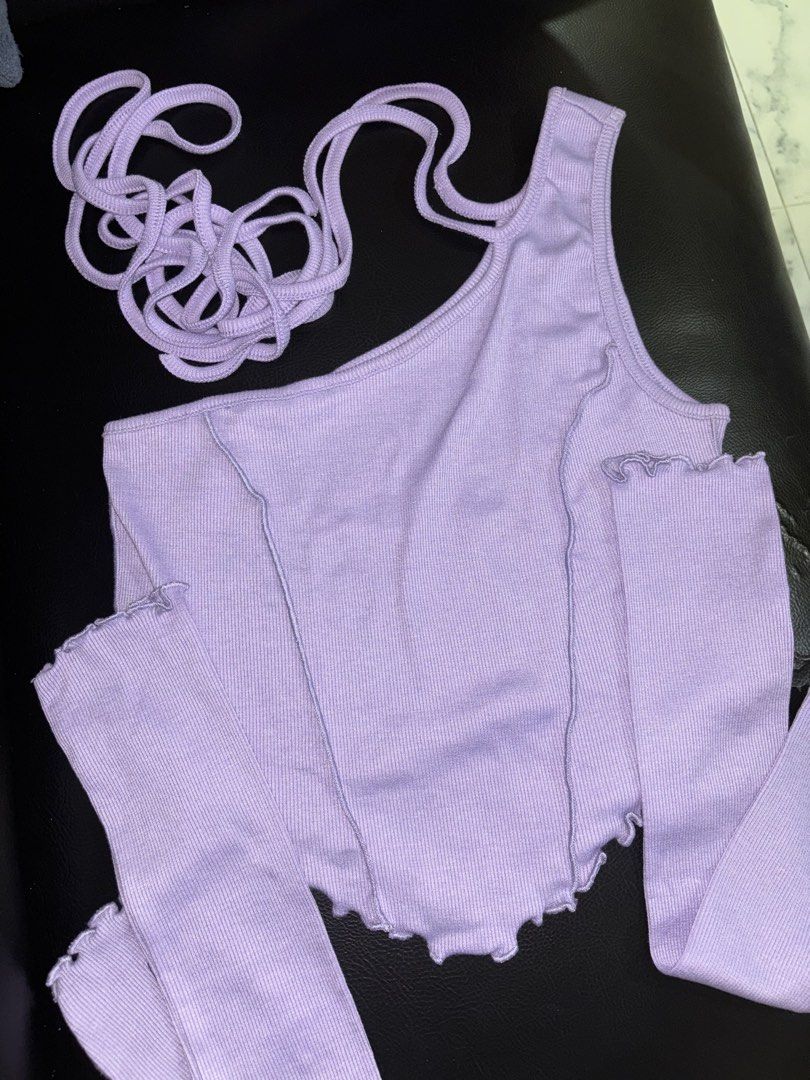 Purple One Sided top (Category: Sleeveless) located in Quezon City. Submitted by den.declutters (Listing ID 1465454187, Image 1). Description: .