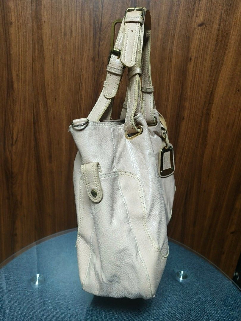 Queen's Tiara Pebbled—Shoulder Tote Bag (Category: Shoulder Bags) located in Baguio. Submitted by luxuryvaultbagsandfashion (Listing ID 1465477184, Image 3). Description: ✨👜Queen’s Tiara Cream Pebbled Shoulder Tote Bag👜✨ Crafted in a soft cream/beige tone with a textured pebbled finish, it effortlessly balances a relaxed silhouette with a polished, high-end look. Perfectly spacious and organized for daily use or office wear. Features & Specific