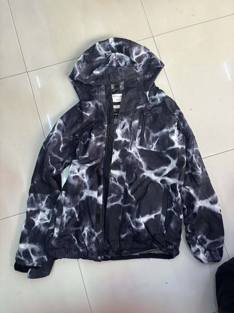 Quiksilver DryFlight Snowboard Jacket Black White Tie Dye Medium (Category: Coats, Jackets and Outerwear) located in Manila. Submitted by michaelge38472 (Listing ID 1465391429, Image 1). Description: - Brand: Quiksilver - Style: Snow jacket in black and white tie-dye wash pattern - Size: Medium - Weather Protection: DryFlight technology - Features: Full zip front, attached hood, zippered chest and hand pockets - Condition/Details: Clear interior 