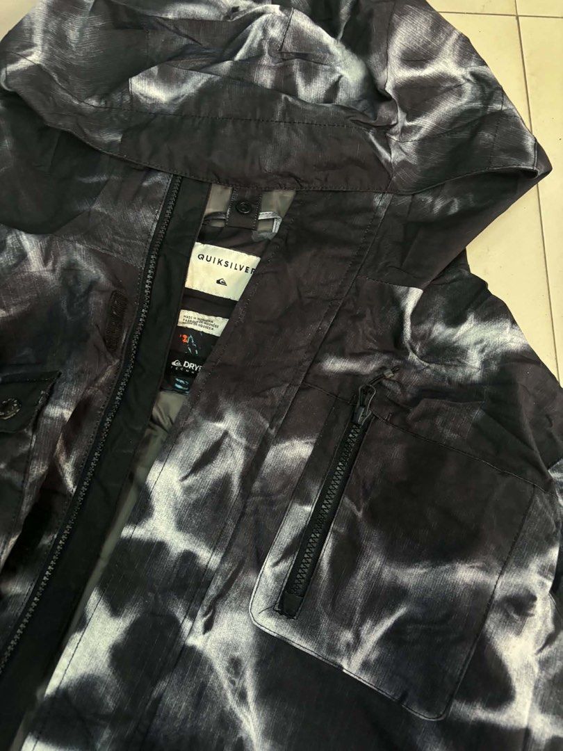 Quiksilver DryFlight Snowboard Jacket Black White Tie Dye Medium (Category: Coats, Jackets and Outerwear) located in Manila. Submitted by michaelge38472 (Listing ID 1465391429, Image 2). Description: - Brand: Quiksilver - Style: Snow jacket in black and white tie-dye wash pattern - Size: Medium - Weather Protection: DryFlight technology - Features: Full zip front, attached hood, zippered chest and hand pockets - Condition/Details: Clear interior 