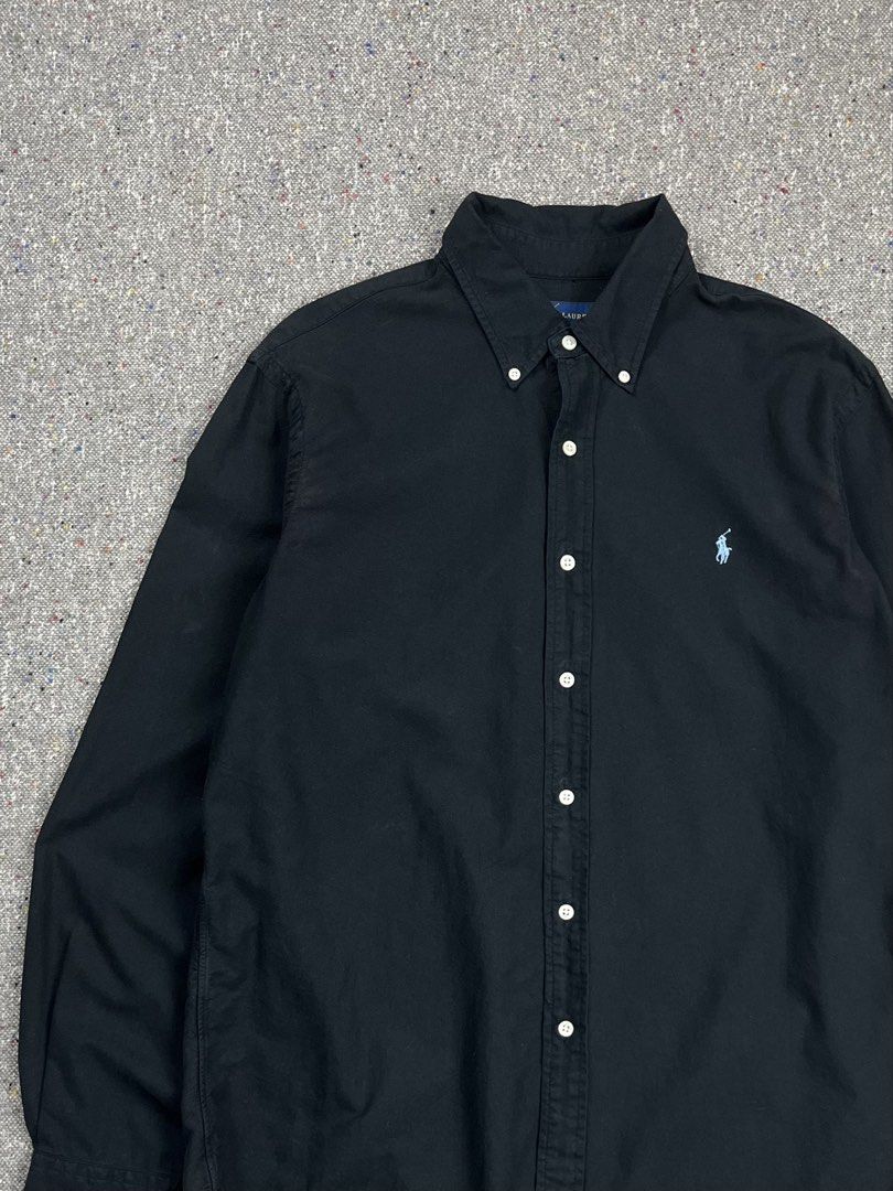 RaIph L@urén black long-sleeve button-down shirt (Category: Luxury Apparel) located in Zamboanga. Submitted by deconstrukt.fit (Listing ID 1465540015, Image 2). Description: R@Iph L@urén black long-sleeve button-down shirt It features the brand’s iconic light blue embroidered pony logo on the left chest, a button-down collar, and white buttons down the front placket. Tag size: Large Measurement (inches) Shoulder: 19” Width: 23.5” Length: 30 Front