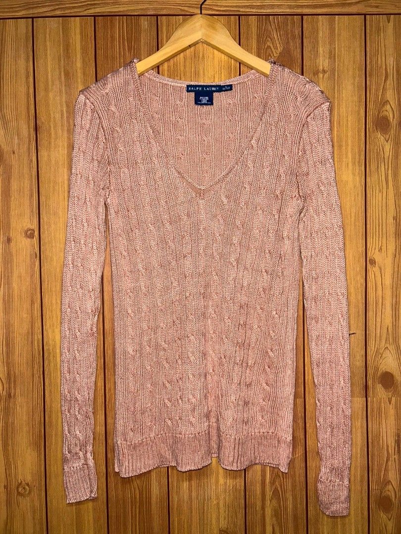 Ralph Lauren Cable Knit V-Neck Sweater (Category: Longsleeves) located in Manila. Submitted by zerowastethriftco. (Listing ID 1465561754, Image 1). Description: -As New Condition -Dimes L26xW16 -No Issue -Italian Yarn Dusty pink/rose hue, featuring a deep ribbed V-neckline and matching ribbed cuffs and hem. This Ralph Lauren cable-knit sweater perfectly fits the "Y2K Preppy" aesthetic, a major early-2000s trend popularized by teen movies like Mea