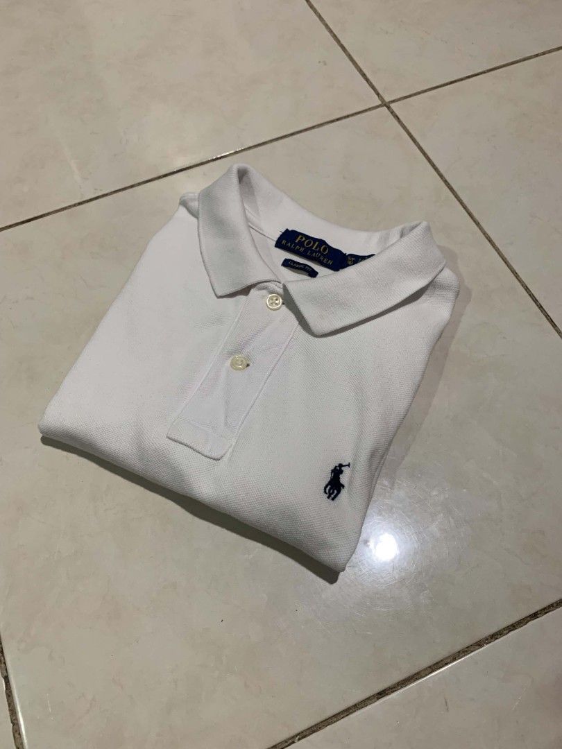 Ralph Lauren Poloshirt (Category: Babies & Kids Fashion) located in Dipolog. Submitted by ethrifttt (Listing ID 1465549224, Image 1). Description: Ralph Lauren White Poloshirt 14.5 width x 23 length (+1 inch likod) need deepwash (see last pic).