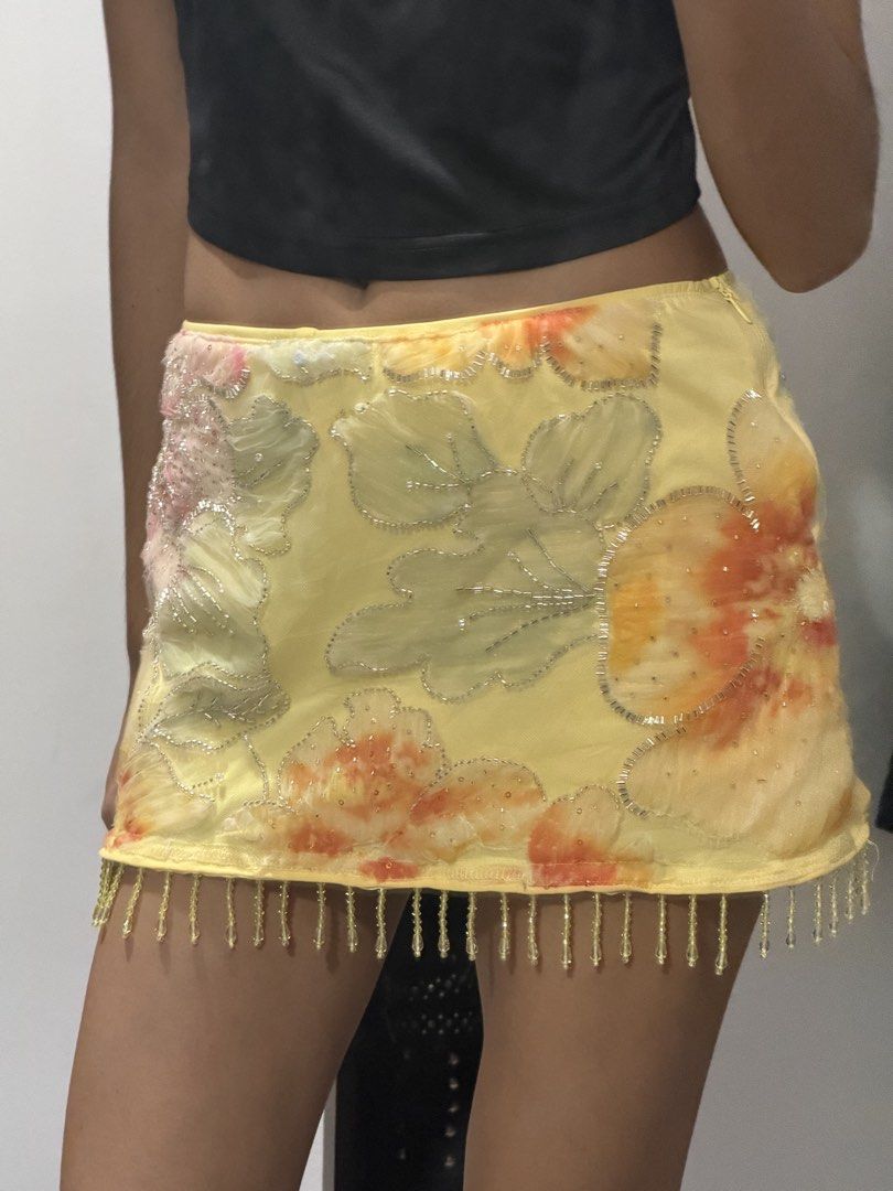 RARE Beaded Y2k yellow skirt (Category: Skirts) located in Pasig City. Submitted by miss_abuelita (Listing ID 1460906697, Image 1). Description: Waist 25-26” Length 10”.