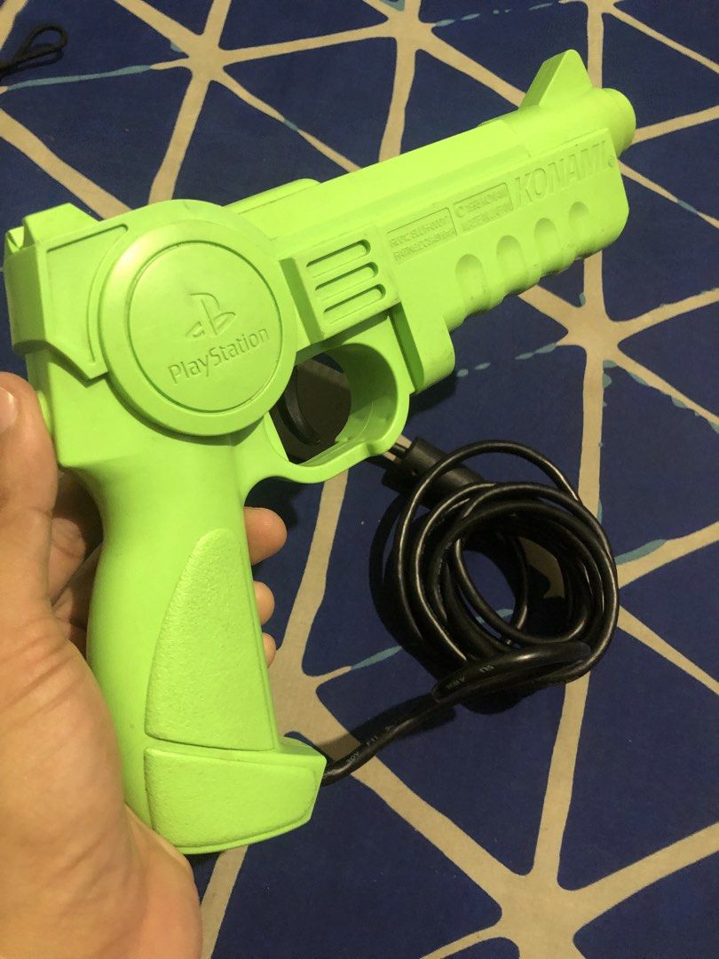 Rare PS1 Neon Green Konami Lightgun blaster (Category: Controllers) located in Quezon City. Submitted by markgolveo (Listing ID 1465452039, Image 3). Description: Rare PS1 Neon Green Konami Lightgun blaster.