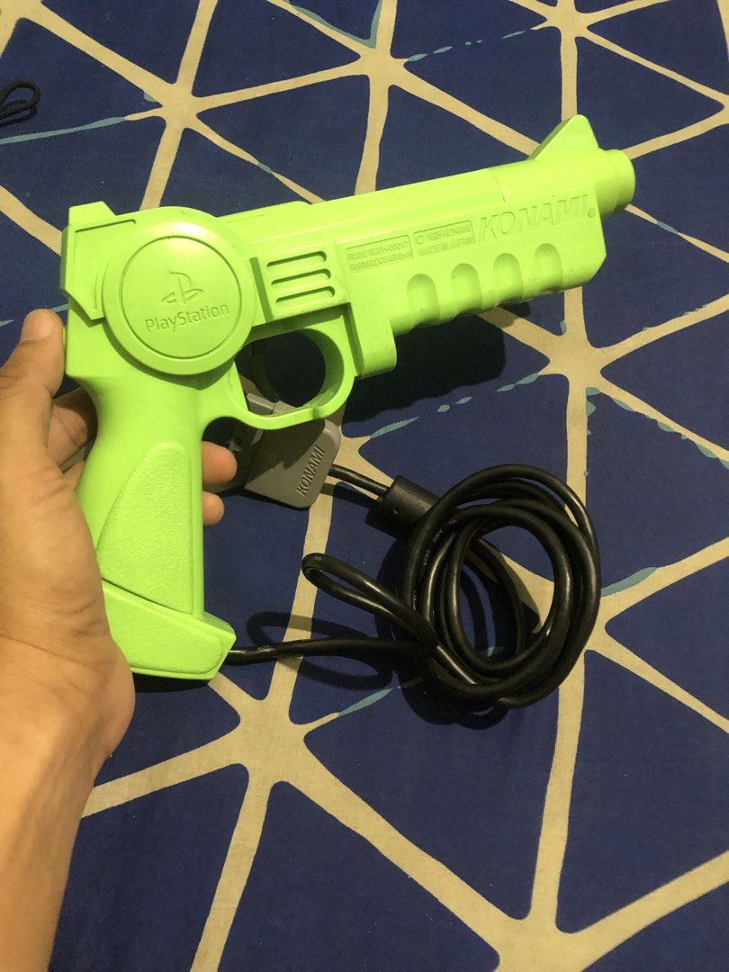 Rare PS1 Neon Green Konami Lightgun blaster (Category: Controllers) located in Quezon City. Submitted by markgolveo (Listing ID 1465452039, Image 2). Description: Rare PS1 Neon Green Konami Lightgun blaster.