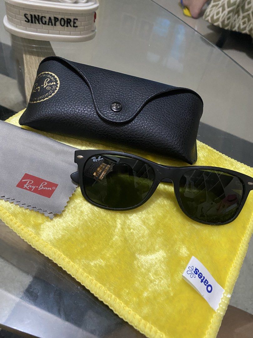 Ray-Ban New Wayfarer (Category: Sunglasses & Eyewear) located in Tarlac. Submitted by nate4stuffs (Listing ID 1465395499, Image 1). Description: bought in usa, used but not abused.