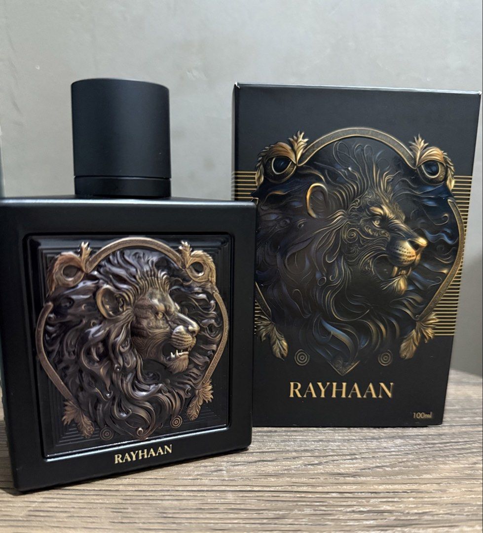 Rayhaan Lion 100ml Eau de Parfum Bottle with Box (Category: Fragrance & Deodorants) located in Cebu City. Submitted by jnathana (Listing ID 1465498487, Image 2). Description: - Brand: Rayhaan - Volume: 100ml - Condition: Like new, sprayed only once to test scent. - Scent Profile: Strong with long-lasting projection - Design: Heavy black bottle featuring a detailed bronze lion and matching cap - Packaging: Complete with original matching box. - RF