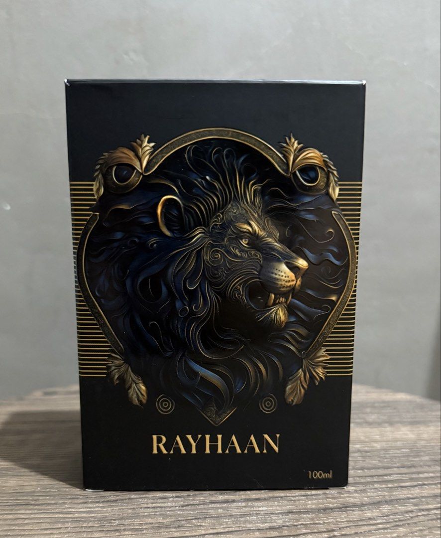 Rayhaan Lion 100ml Eau de Parfum Bottle with Box (Category: Fragrance & Deodorants) located in Cebu City. Submitted by jnathana (Listing ID 1465498487, Image 1). Description: - Brand: Rayhaan - Volume: 100ml - Condition: Like new, sprayed only once to test scent. - Scent Profile: Strong with long-lasting projection - Design: Heavy black bottle featuring a detailed bronze lion and matching cap - Packaging: Complete with original matching box. - RF