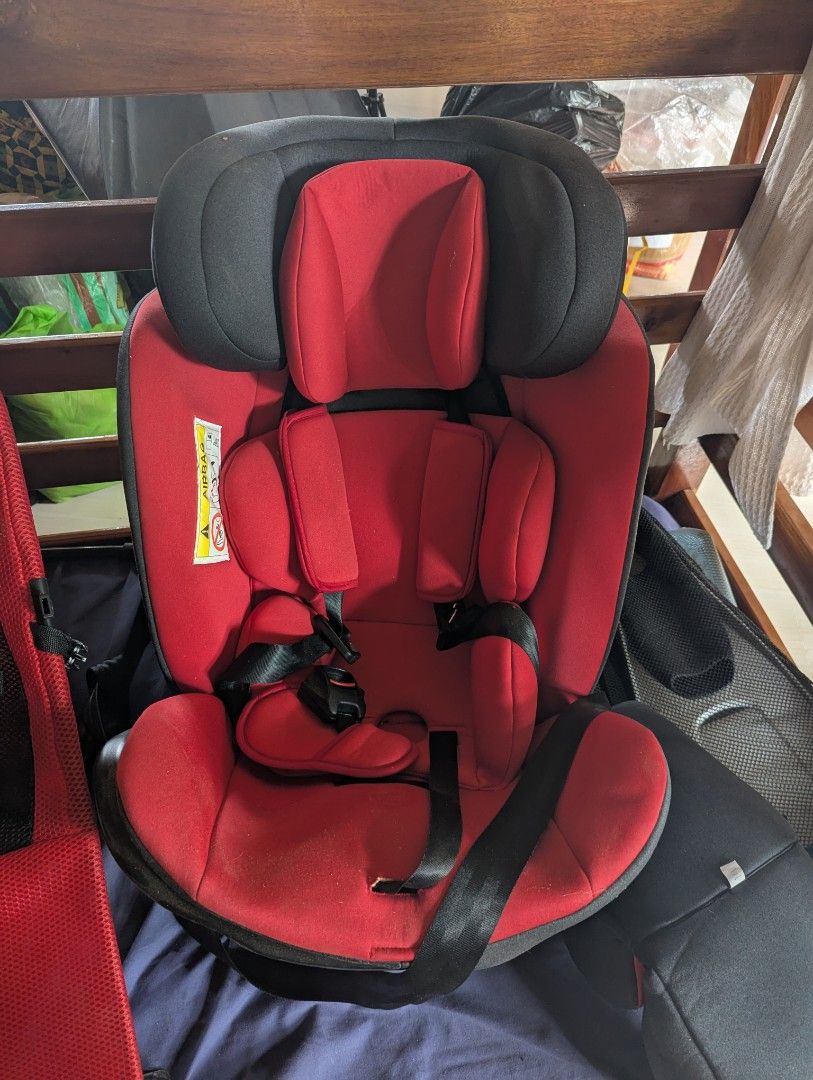 Red and Black Child Car Seat (Category: Car Seats) located in Mambajao. Submitted by maximus308 (Listing ID 1465391676, Image 1). Description: - Color: Red and black - Built-in harness straps and adjustable headrest for growing kids - Extra padded fabric covers for maximum comfort - Sturdy black safety belt setup - Clean and ready for back seat installation.