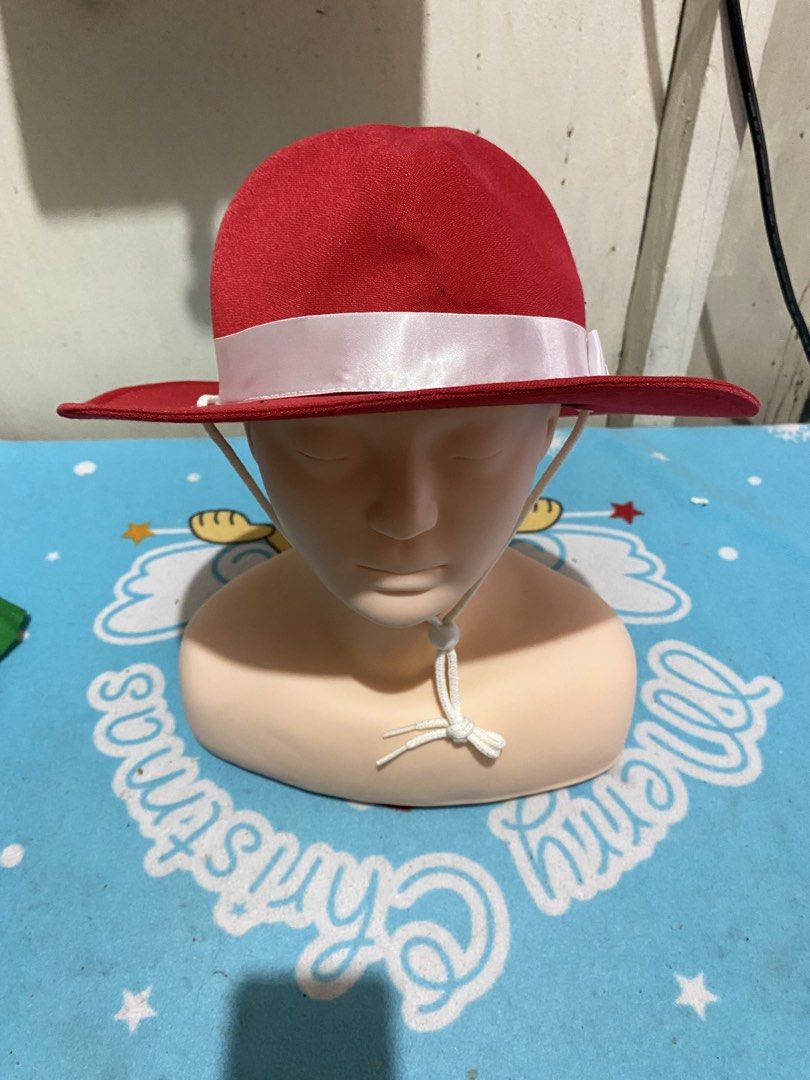 Red Fedora Hat with White Ribbon and Chin Strap (Category: Hats & Beanies) located in Manila. Submitted by resi.diaz (Listing ID 1465431504, Image 1). Description: - Color: Bright red - Features: White satin ribbon with bow around the crown - Brim: Wide brim style - Security: Adjustable white cord chin strap with a toggle - Condition: Clean fabric - Best for: Outdoor wear or costume use.
