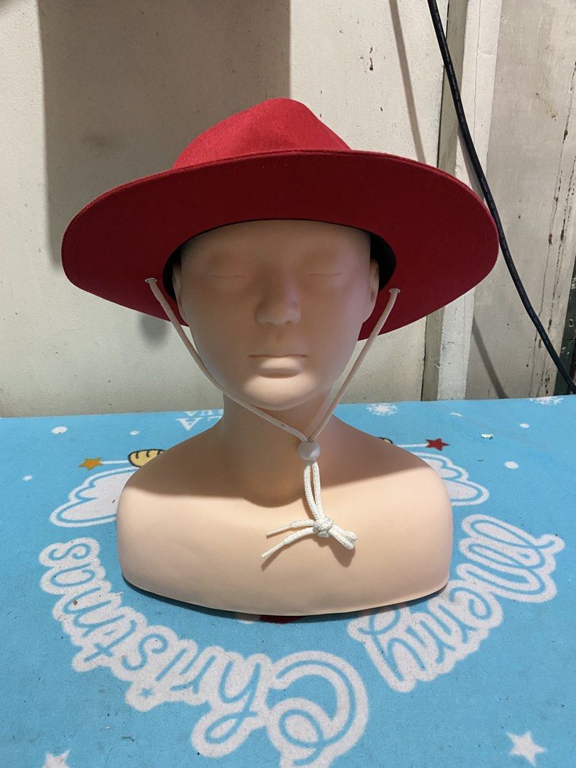 Red Fedora Hat with White Ribbon and Chin Strap (Category: Hats & Beanies) located in Manila. Submitted by resi.diaz (Listing ID 1465431504, Image 2). Description: - Color: Bright red - Features: White satin ribbon with bow around the crown - Brim: Wide brim style - Security: Adjustable white cord chin strap with a toggle - Condition: Clean fabric - Best for: Outdoor wear or costume use.