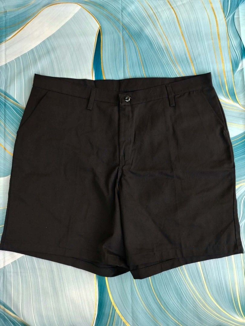 Red Kap Black Work Shorts (Category: Shorts) located in Manila. Submitted by virgiliosa38485 (Listing ID 1465507197, Image 3). Description: - Brand: Red Kap - Color: Black -Size 40 -Length 20 - Material: Durable cotton blend - Closure: Button closure with zip fly - Waistband: Features belt loops - Pockets: Two front slash pockets and two back welt pockets (one with button closure) - Details: Red Kap brand patch on the right back pocket and orange