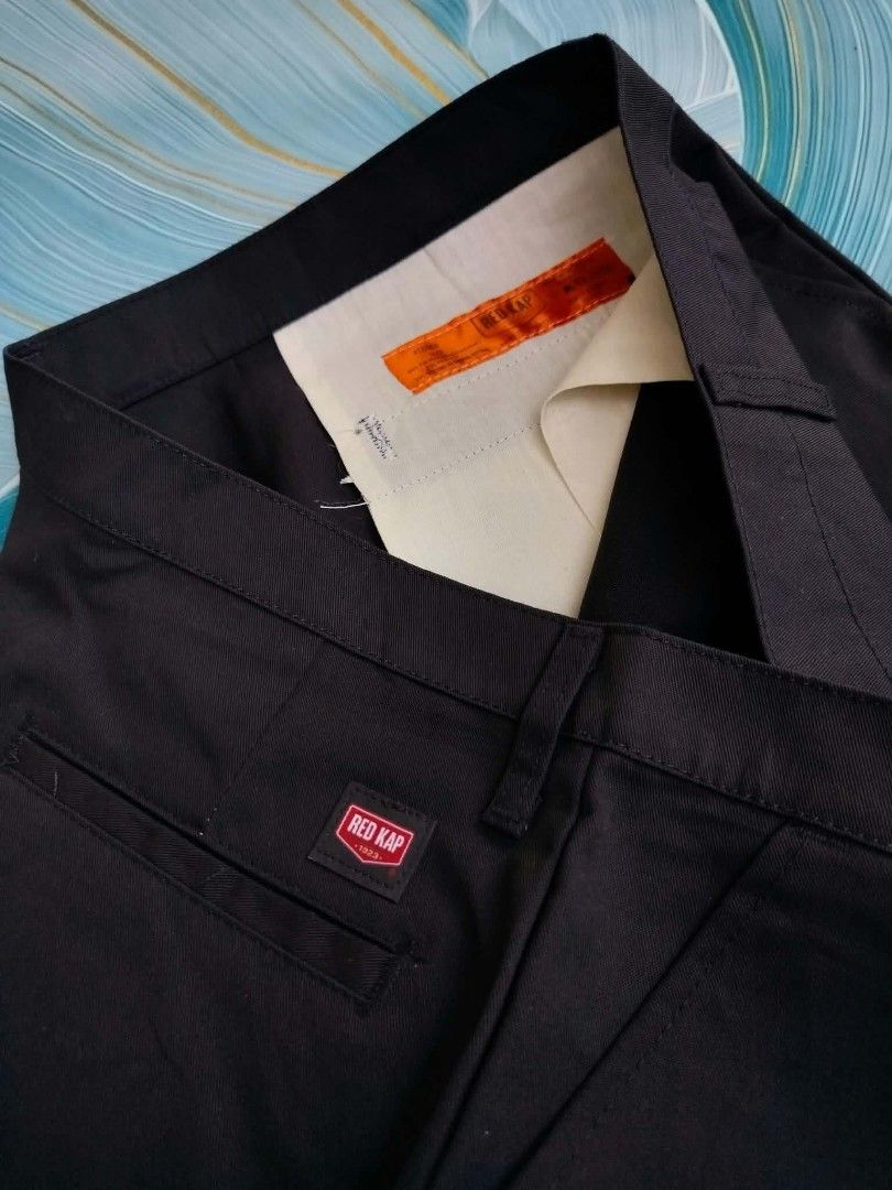 Red Kap Black Work Shorts (Category: Shorts) located in Manila. Submitted by virgiliosa38485 (Listing ID 1465507197, Image 2). Description: - Brand: Red Kap - Color: Black -Size 40 -Length 20 - Material: Durable cotton blend - Closure: Button closure with zip fly - Waistband: Features belt loops - Pockets: Two front slash pockets and two back welt pockets (one with button closure) - Details: Red Kap brand patch on the right back pocket and orange