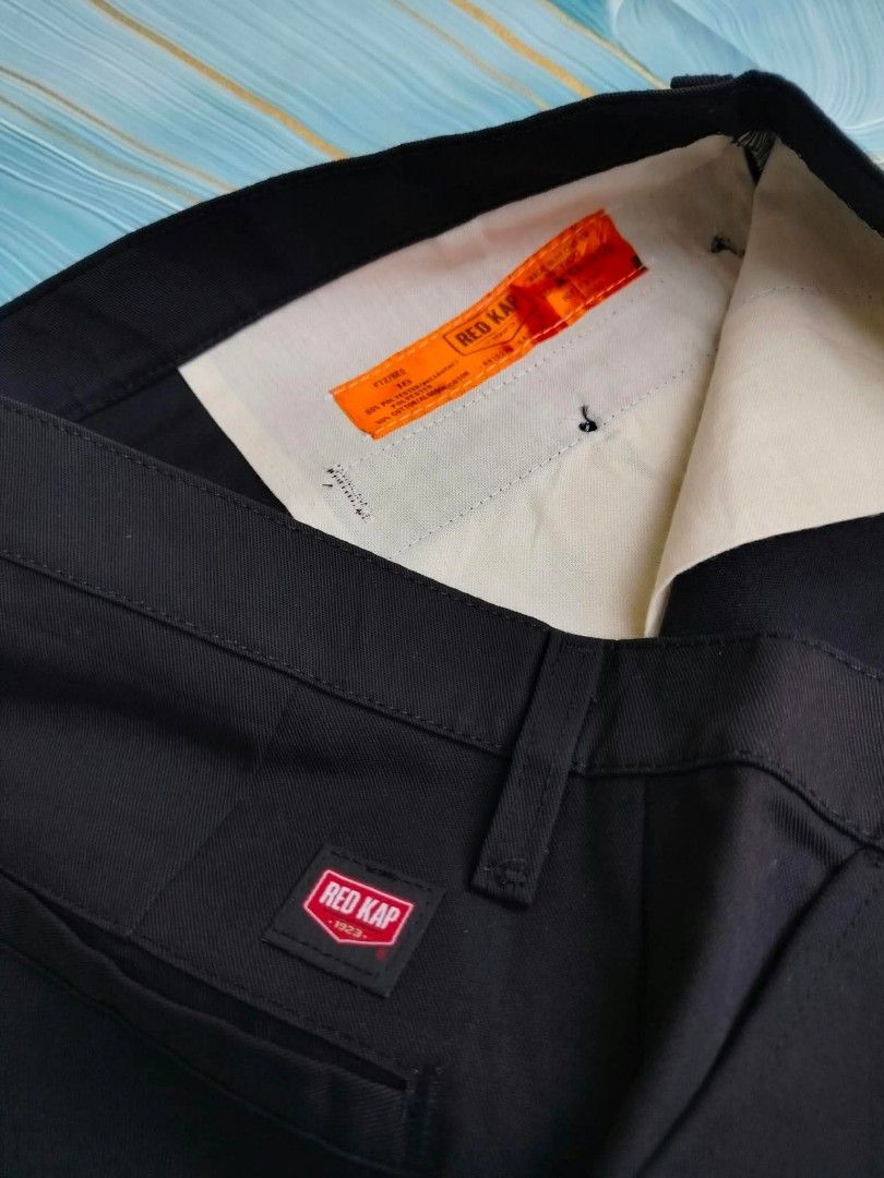Red Kap Black Work Shorts Size 38 (Category: Shorts) located in Manila. Submitted by virgiliosa38485 (Listing ID 1465506706, Image 2). Description: - Brand/Model: Red Kap Work Shorts - Size: 38 -Length 20 - Color: Classic Black - Material: Sturdy & durable cotton-poly blend - Closure: Button closure with secure zipper fly - Pockets: Two back welt pockets (left with button closure, right with Red Kap logo patch) - Details: Orange interior waistban