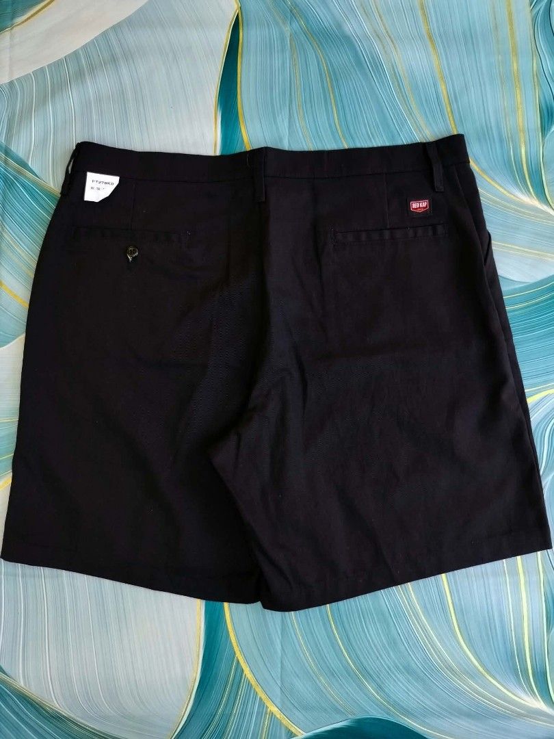 Red Kap Black Work Shorts Size 38 (Category: Shorts) located in Manila. Submitted by virgiliosa38485 (Listing ID 1465506706, Image 1). Description: - Brand/Model: Red Kap Work Shorts - Size: 38 -Length 20 - Color: Classic Black - Material: Sturdy & durable cotton-poly blend - Closure: Button closure with secure zipper fly - Pockets: Two back welt pockets (left with button closure, right with Red Kap logo patch) - Details: Orange interior waistban