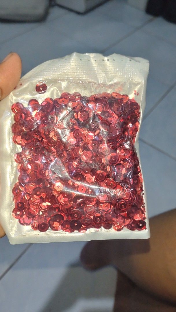 Red Sequin Pack Loose Cup Sequins for Crafting Sewing (Category: Craft Supplies & Tools) located in Valenzuela. Submitted by diane.35 (Listing ID 1465485012, Image 1). Description: - Item: Small red sequins - Condition: Brand new, unopened sealed pouch - Finish: Bright metallic that catches the light - Quantity: Lots of pieces included - Ideal for: Sewing, embroidery, and various DIY craft projects.