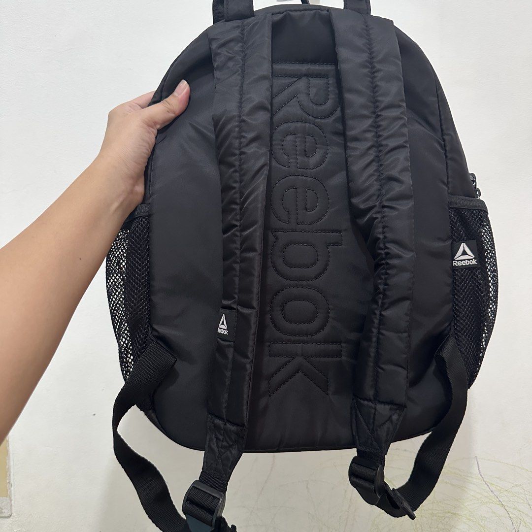 Reebok Black Nylon Backpack with Side Mesh Pockets (Category: Backpacks) located in Kawit. Submitted by wevibevintage (Listing ID 1465406955, Image 2). Description: .