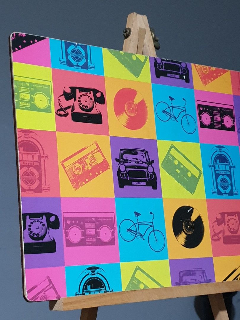 Retro Pop Art Cork Placemat (Category: Vintage Collectibles) located in Las Pinas. Submitted by oldsthetics (Listing ID 1465419288, Image 3). Description: Retro Pop Art Cork Placemat Featuring a grid of nostalgic 20th-century items like boomboxes, cassette tapes, vintage cars, and rotary phones As placemat or retro display accent 4pcs available Approx 8.5 x 11.5 inches This is used as display item Preloved and not new May have imperfections Typic