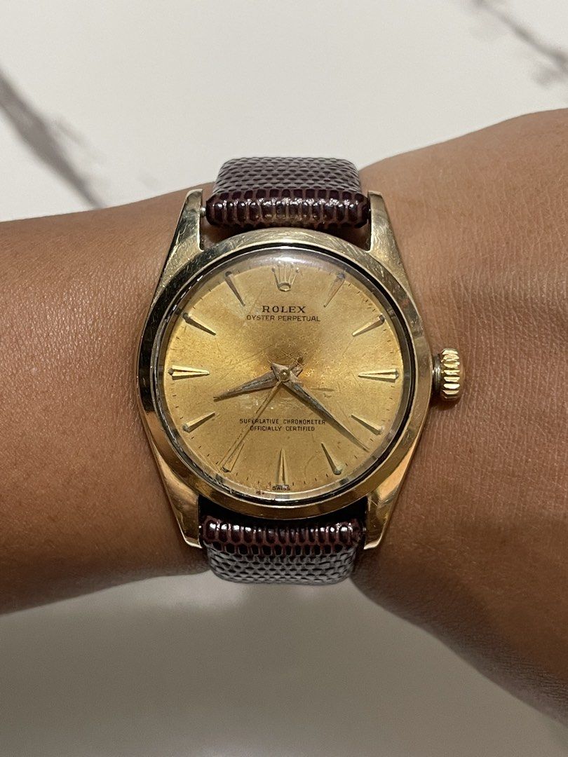 Rolex Oyster Perpetual (Category: Luxury Watches) located in Taguig. Submitted by j_watches007 (Listing ID 1465422971, Image 1). Description: Secondhand Used Watch Vintage Rolex Oyster Perpetual Swiss Made Automatic 1560 6634 Gold Tone Front Back Gold Tone Dial ( Patina, Gasgas ) Stainless Steel Back Case 34mm Replacement Leather, Buckle.