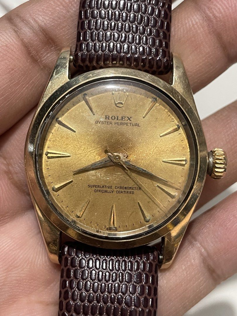 Rolex Oyster Perpetual (Category: Luxury Watches) located in Taguig. Submitted by j_watches007 (Listing ID 1465422971, Image 3). Description: Secondhand Used Watch Vintage Rolex Oyster Perpetual Swiss Made Automatic 1560 6634 Gold Tone Front Back Gold Tone Dial ( Patina, Gasgas ) Stainless Steel Back Case 34mm Replacement Leather, Buckle.