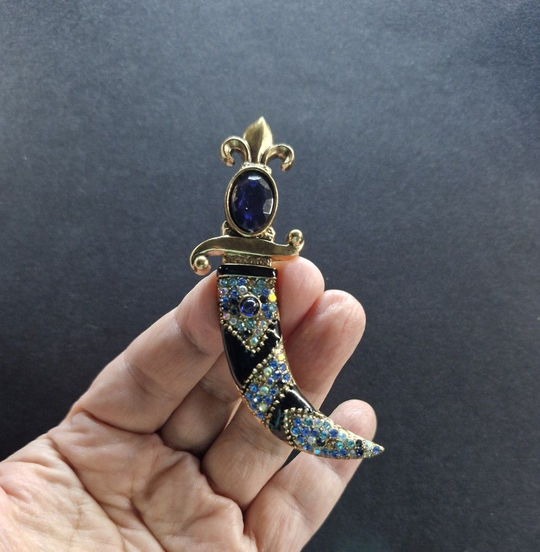 Royal Dagger Brooch (Category: Brooches) located in Taguig. Submitted by mommaschoice (Listing ID 1465517691, Image 2). Description: Brand New Unisex use Adorned w/ mix colored rhinestones Statement piece for suits, jackets Lightweight won't damage the fabric Ships nationwide.