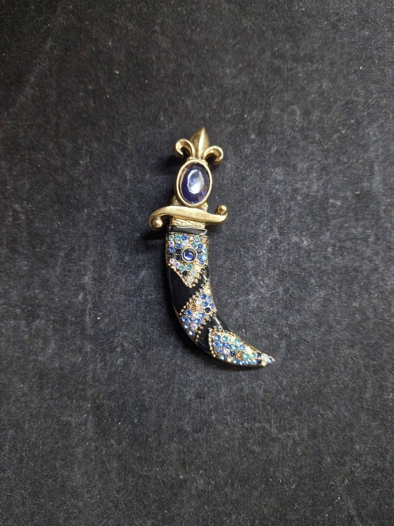 Royal Dagger Brooch (Category: Brooches) located in Taguig. Submitted by mommaschoice (Listing ID 1465517691, Image 1). Description: Brand New Unisex use Adorned w/ mix colored rhinestones Statement piece for suits, jackets Lightweight won't damage the fabric Ships nationwide.