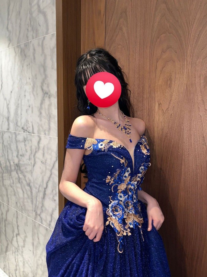 Royal Gown (FOR RENT) (Category: Evening dresses & gowns) located in Manila. Submitted by k_0ye (Listing ID 1465445526, Image 1). Description: - Color: Royal blue with a glitter finish - Design: Off-the-shoulder with a plunging V-cut and intricate blue & gold floral embroidery on the bodice - Fit: Adjustable lace-up corset back - Length: Floor-length flared skirt - Best for: Prom, formal parties, and evening galas.