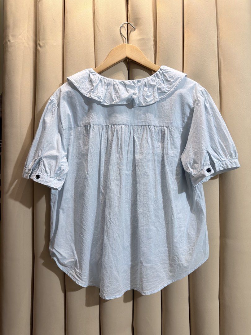 Ruffle Collar Pintuck Blouse (Category: Blouses) located in Manila. Submitted by glamstylemnl (Listing ID 1465457467, Image 2). Description: ♡ SIZE: L ♡ BUST: 41 ♡ Swipe left to see the actual color & details ♡ button-up / black embroidered vertical trim / ruffle collar ♡ HQ • 10/10 ♡ Ready to wear 👚.