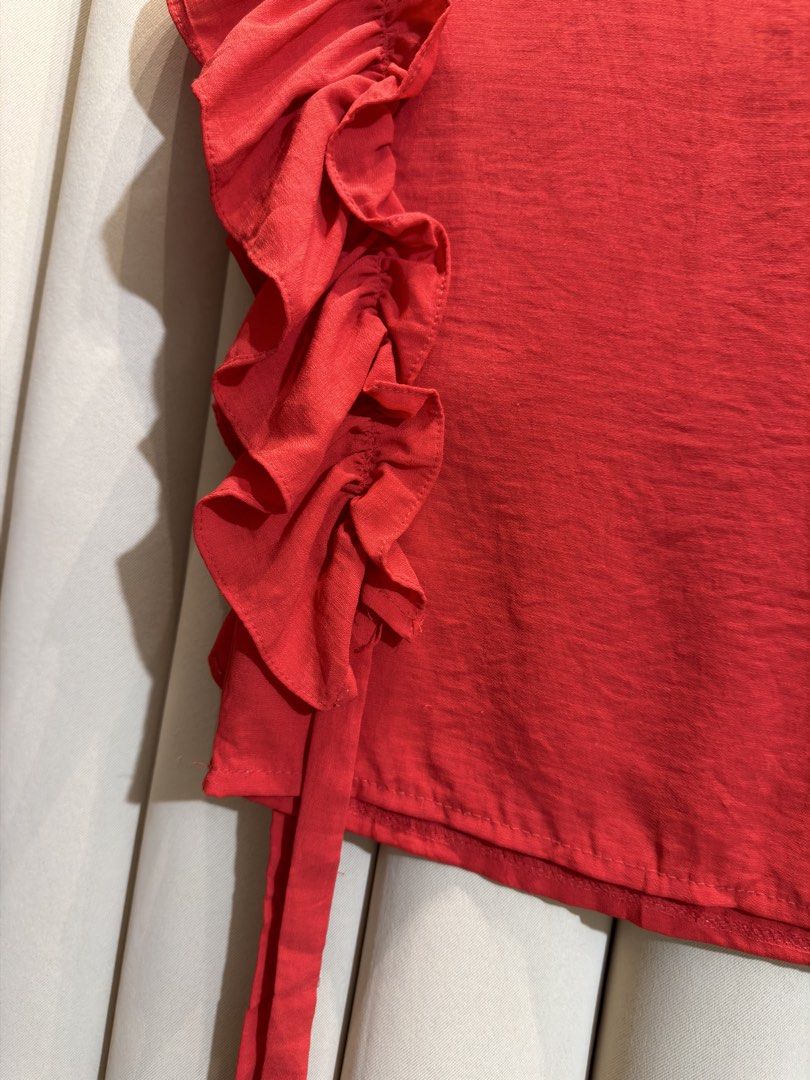 Ruffled Sleeve Blouse (Category: Sleeveless) located in Manila. Submitted by glamstylemnl (Listing ID 1465423274, Image 3). Description: ♡ SIZE: XS ♡ BUST: 30 ♡ Swipe left to see the actual color & details ♡ cascading ruffles / hanging sides ties ♡ HQ • 10/10 ♡ Ready to wear 👚.