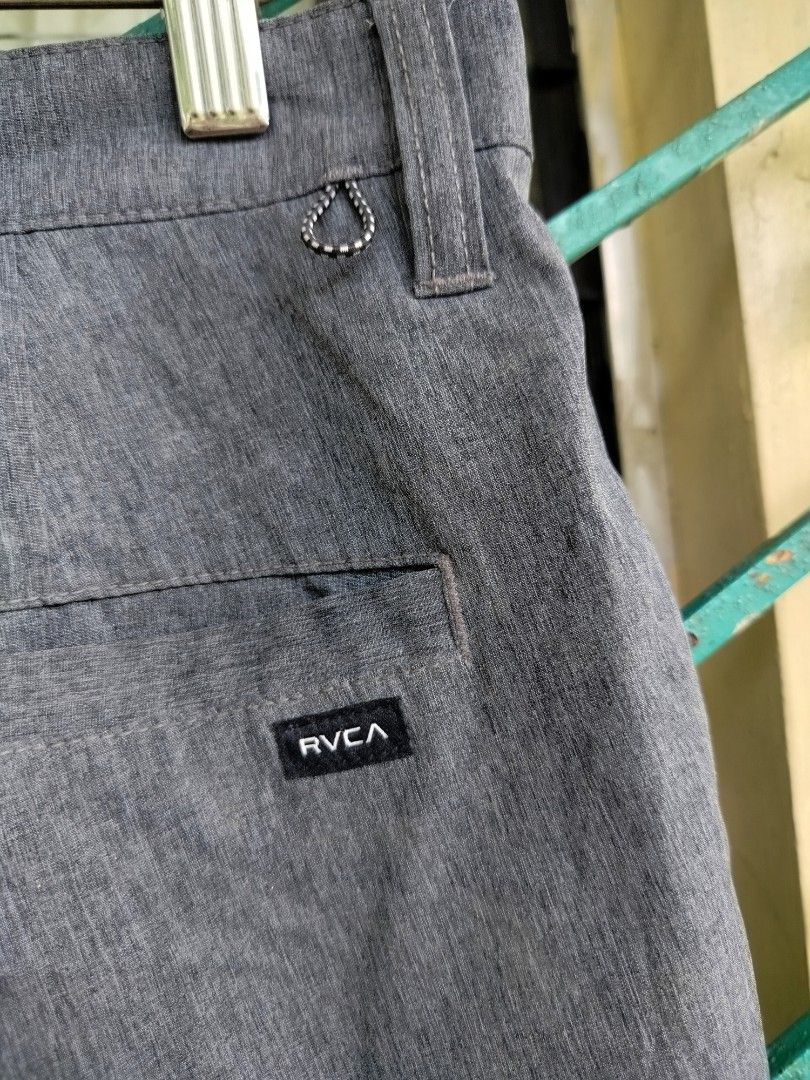 RVCA 4-Way Performance Stretch Gray Boardshorts Size 32 (Category: Swim Trunks & Board Shorts) located in Manila. Submitted by gerald_quinto (Listing ID 1465471206, Image 2). Description: Gray RVCA boardshorts in size 32. Made with 4-way performance stretch fabric, 46% recycled polyester, 46% polyester, and 8% elastane. Button closure with zip fly. Two back welt pockets with small black RVCA label on the right pocket. Loop detail near the waistba
