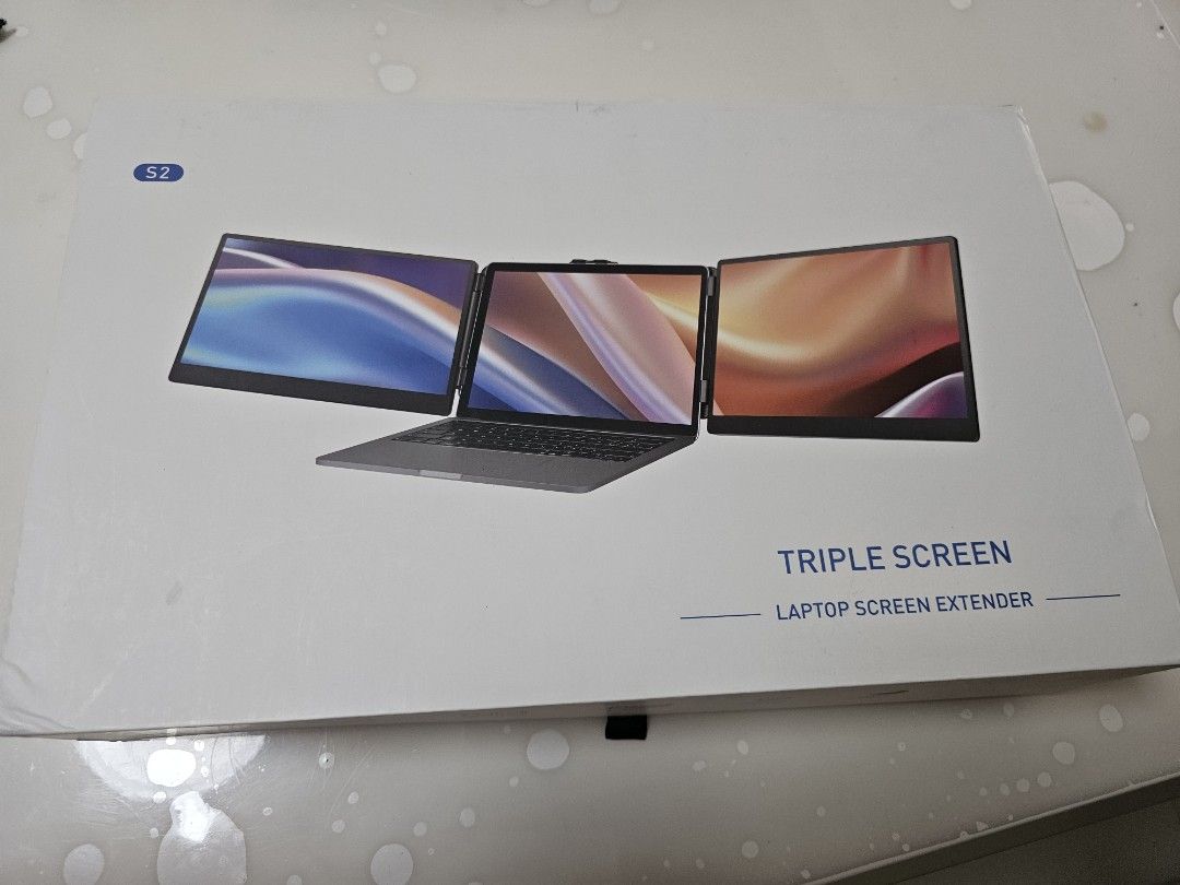 S2 Triple Screen Laptop Screen Extender 14 Inches (Category: Laptops & Notebooks) located in Santo Tomas. Submitted by buybugs (Listing ID 1465550811, Image 1). Description: - Model: S2 Triple Screen Laptop Extender - Display: Dual 14-inch IPS screens with 1920x1080 resolution and 60Hz refresh rate - Condition: Excellent working condition, easy to set up - Perfect for: Ultimate on-the-go multitasking and remote work - Inclusions: Original box, pr