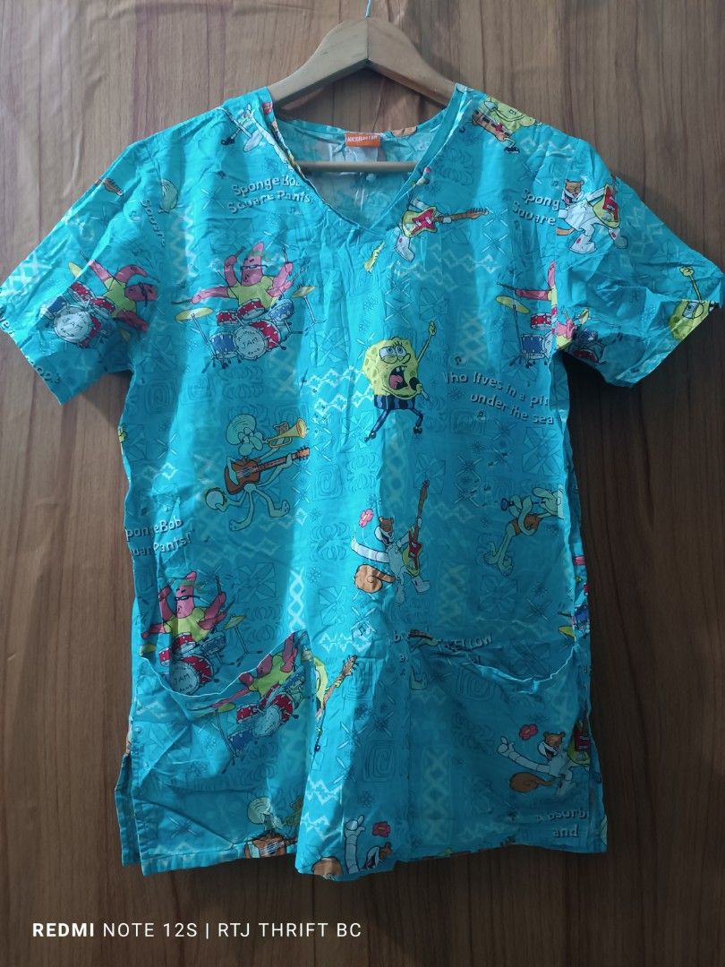S3: Nickelodeon SpongeBob Scrub Top Only (Category: Others Tops) located in Baguio. Submitted by thanksgodforthedogs (Listing ID 1465475942, Image 2). Description: Details and Measurements on the first photo. Excellent Used Condition, Like New to Good as New Last Price: P150 + SF.