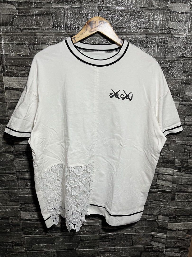 Sacai X Kaws Shirt (Category: Tshirts & Polo Shirts ) located in Manila. Submitted by flex_curation (Listing ID 1465405115, Image 1). Description: 25x28 IN VERY GOOD CONDITION BACOOR CAVITE LOC.