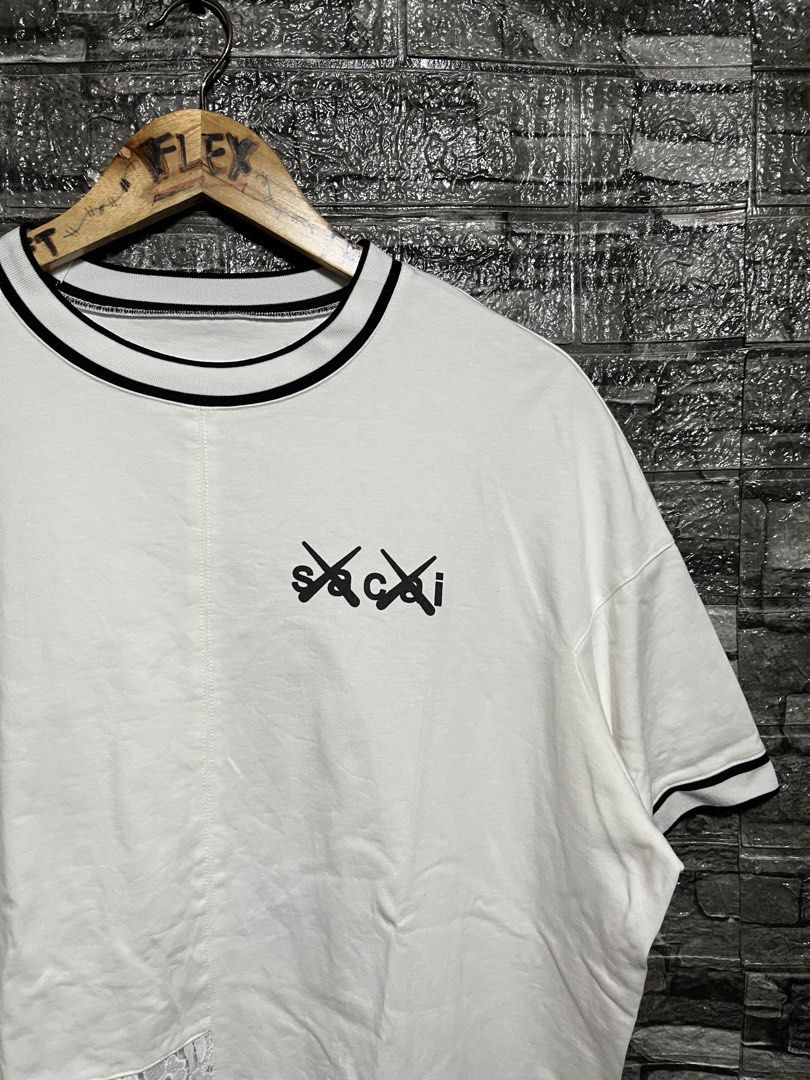 Sacai X Kaws Shirt (Category: Tshirts & Polo Shirts ) located in Manila. Submitted by flex_curation (Listing ID 1465405115, Image 2). Description: 25x28 IN VERY GOOD CONDITION BACOOR CAVITE LOC.