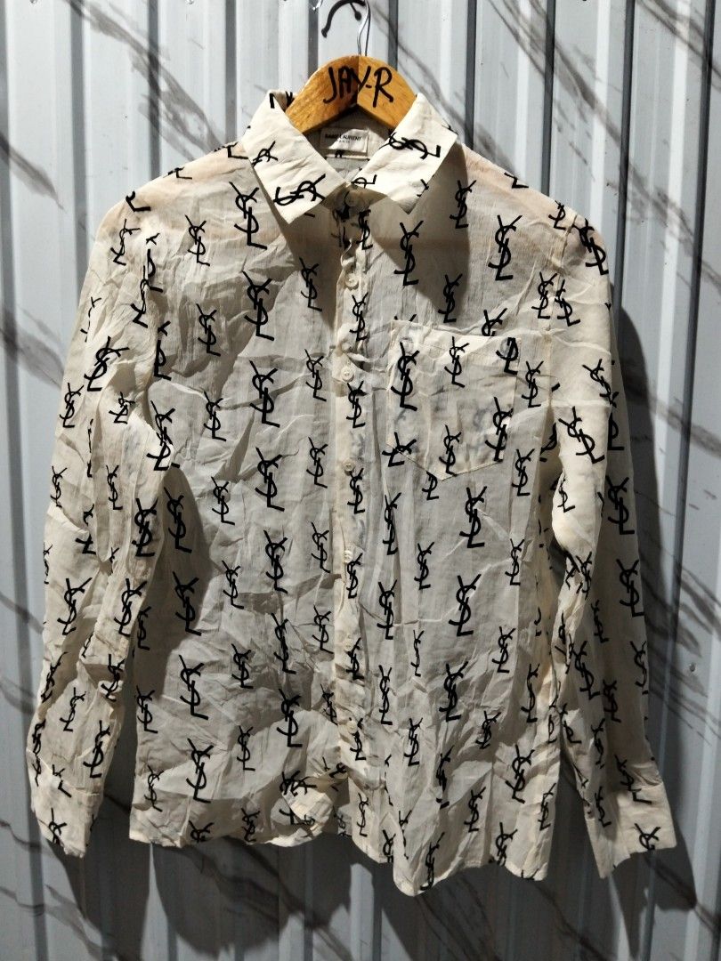 Saint Laurent Paris YSL Monogram Silk Shirt (Category: Luxury Apparel) located in Manila. Submitted by brarynpag30556 (Listing ID 1465571481, Image 1). Description: - Brand: Saint Laurent Paris - Color: Cream with allover black YSL monogram print - Details: Long sleeves with button cuffs, front chest pocket, classic collar - Origin: Made in Italy - Product Code: UP53 2017 00137 T9P2 429373 Y2OO1 1015 - Condition: Excellent, guaranteed authentic -
