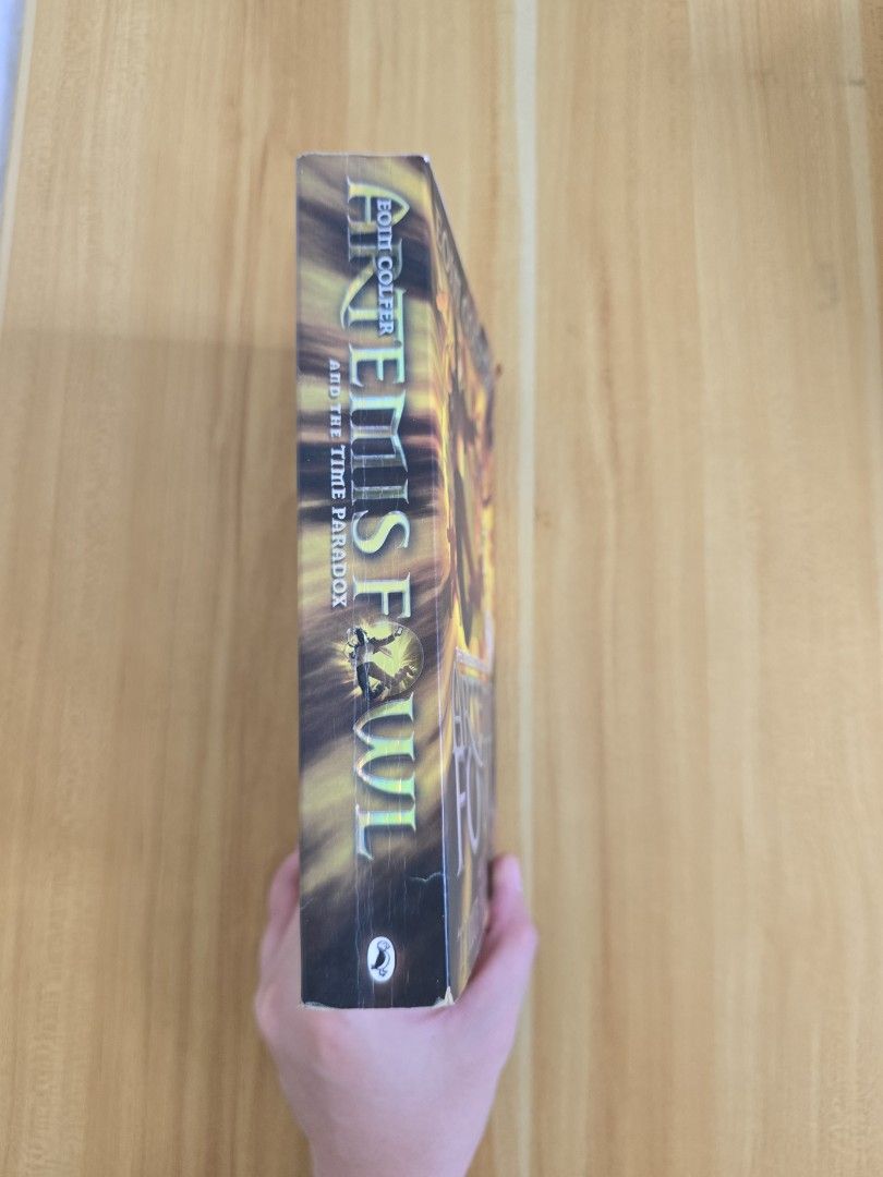 Artemis Fowl by Eoin Colfer (Category: Children's Books) located in Trece Martires City. Submitted by closette.ph (Listing ID 1465407347, Image 3). Description: 💌 click photos to view full item 🌷Genre : Young Adult / Adventure - rfs : apartment cleanout 🌸 - Paperback Edition - Authentic copy - personal preloved books - has signs of usage - colors may vary due to lighting.