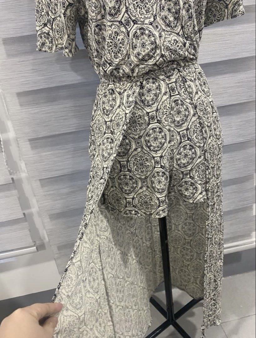 🔥SALE🔥Speechless Black and White Patterned Romper Size S (Category: Rompers) located in Bula. Submitted by kimmcatt (Listing ID 1465398548, Image 2). Description: - Brand/Style: Speechless romper - Color/Pattern: Black and white print - Size: S (Made in China) - Design: V-neckline, short sleeves, elastic waistband, and attached sheer overlay skirt with a front split over shorts - Material: Lightweight and flowy - Condition/Vibe: Very comfortabl