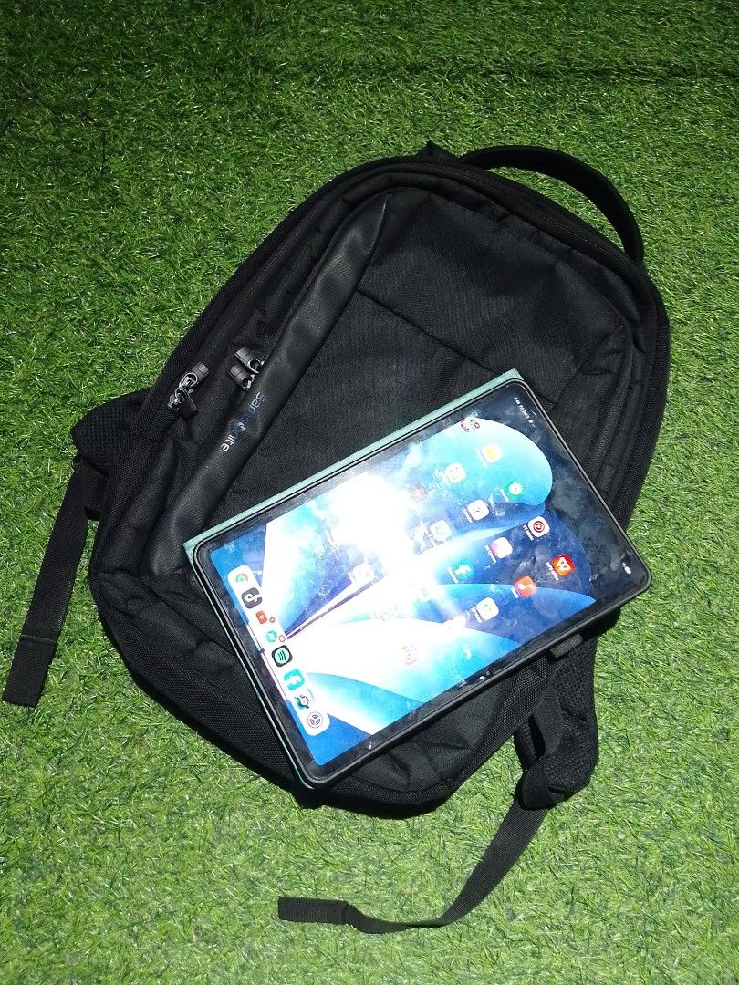Samsonite Black Laptop Backpack (Category: Backpacks) located in Manila. Submitted by patrickjos06722 (Listing ID 1465495452, Image 2). Description: - Authentic Samsonite backpack in classic black - Padded shoulder straps and back panel for all-day comfort - Vibrant blue interior lining with multiple zippered pockets - Built-in organizers for your tech gear and daily essentials - Sturdy top handle for easy grab-and-go - Note: Tablet shown in phot