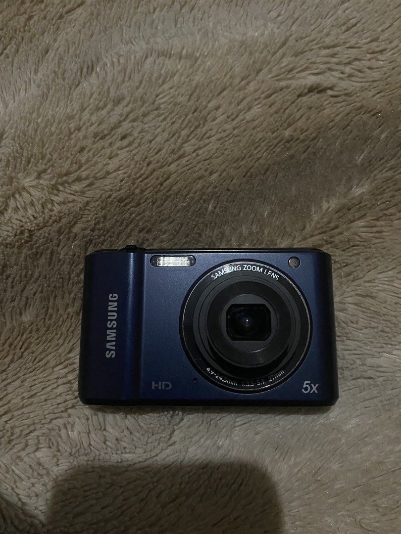 Samsung ES90 (Category: Cameras) located in Alaminos. Submitted by chichiyr (Listing ID 1465467209, Image 3). Description: negotiable if sure buyer SAMSUNG ES90 - Color: Dark blue, compact and pocket-friendly body - Lens: Built-in 5x zoom (4.9-24.5mm range) - Video: HD video recording capability - Modes: Smart Auto, Program, and multiple shooting modes - Condition: Tested and working great, ready to use ISSUE: - lcd burn (you can see it in the pi