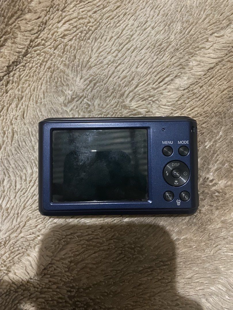 Samsung ES90 (Category: Cameras) located in Alaminos. Submitted by chichiyr (Listing ID 1465467209, Image 2). Description: negotiable if sure buyer SAMSUNG ES90 - Color: Dark blue, compact and pocket-friendly body - Lens: Built-in 5x zoom (4.9-24.5mm range) - Video: HD video recording capability - Modes: Smart Auto, Program, and multiple shooting modes - Condition: Tested and working great, ready to use ISSUE: - lcd burn (you can see it in the pi