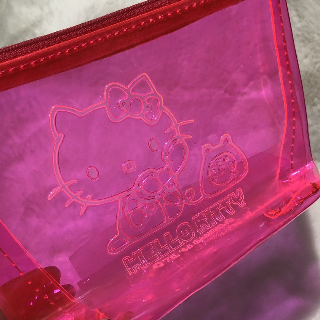Sanrio Hello Kitty Neon PVC Pouch (Category: Purses & Pouches) located in Quezon City. Submitted by kitsune.treasures (Listing ID 1465497034, Image 2). Description: *First to pay policy! *1 day reservation only. Failure to pay on time, auto cancel. 📍Quezon City * MOD: J&T | Lalamove * MOP: GCASH | BPI 📦ON HAND AND READY TO SHIP! CONDITION: WHAT YOU SEE IS WHAT YOU GET. Dimensions: Kindly check the photos for the actual measurements. Please chec
