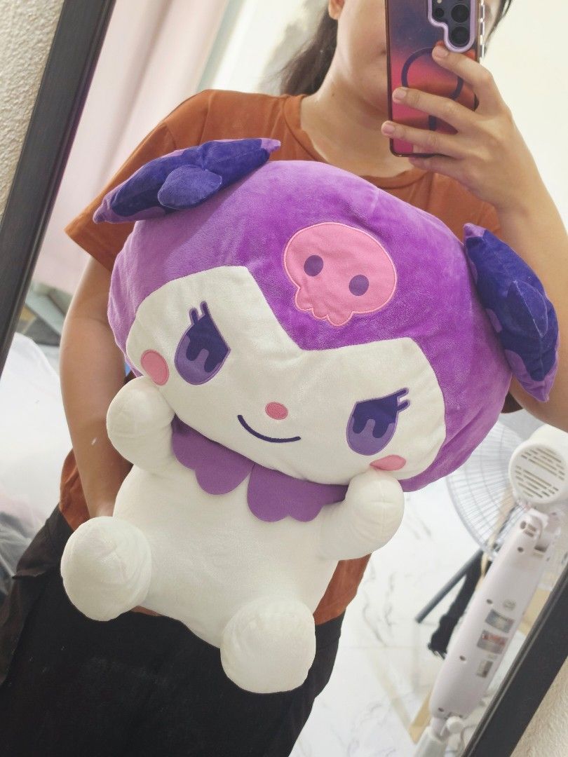 Sanrio Kuromi Plush Toy Huggable (Category: Plushies & Soft Toys) located in Bacolod City. Submitted by shop_with_mi (Listing ID 1465438396, Image 1). Description: P650 to P850 each - Item: Sanrio Kuromi Plush Toy - Condition: Clean, well-maintained, from a smoke-free space - Design: Sitting pose, white body, black hood, pink skull on forehead, and pink collar accents - Material: Soft, fluffy, and huggable - Perfect for: Sanrio collectors and fan