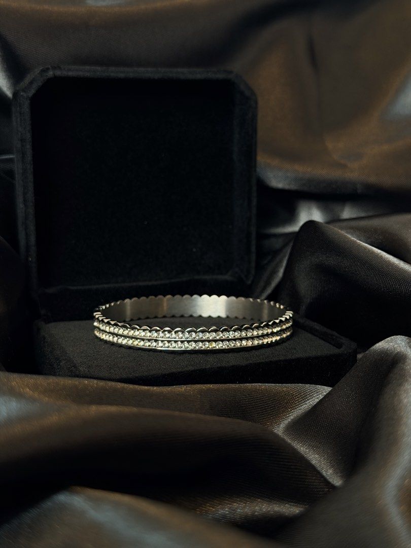 Scalloped Bangle Stainless Steel (Category: Jewelry) located in Manila. Submitted by frost.collections (Listing ID 1465430584, Image 2). Description: The Scalloped Bangle from the Icy Collection featuring crystal detailing in durable stainless steel. designed to add texture and shine to your wrist. .