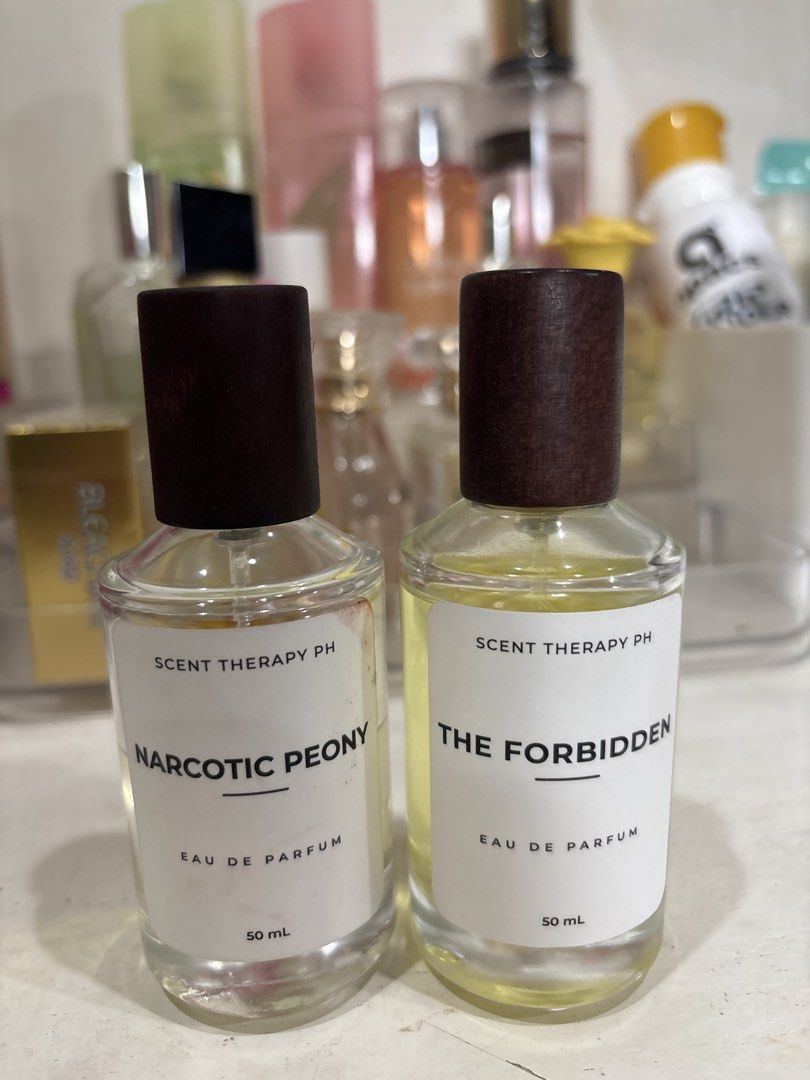 Scent Therapy PH Narcotic Peony and The Forbidden Eau De Parfum (Category: Fragrance & Deodorants) located in Cabadbaran. Submitted by manualrj2491753 (Listing ID 1465387708, Image 1). Description: - Brand: Scent Therapy PH - Set includes: 2 bottles (Narcotic Peony (60% remaining) and The Forbidden (95% remaining)) - Volume: 50 mL each - Note: Selling as a set only, perfect way to sample both fragrances - RFS: too many perfume.