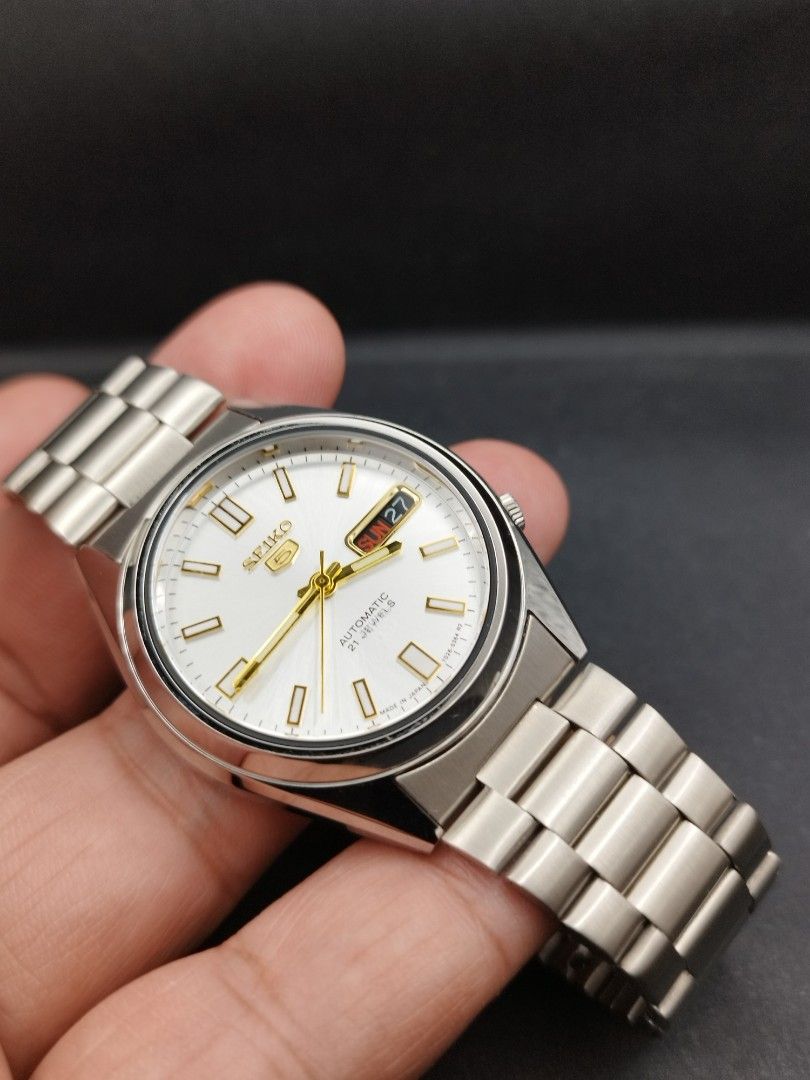 Seiko 5 automatic watch black calendar (Category: Men's Watches) located in Quezon City. Submitted by ars_watches (Listing ID 1465405142, Image 3). Description: original Seiko 7009 movement bnew aftermarket stainless steel base dial hands and strap in good running condition newly overhauled and oiled movement 37mm case dm with box and paper bag.