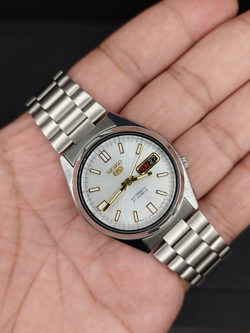 Seiko 5 automatic watch black calendar (Category: Men's Watches) located in Quezon City. Submitted by ars_watches (Listing ID 1465405142, Image 1). Description: original Seiko 7009 movement bnew aftermarket stainless steel base dial hands and strap in good running condition newly overhauled and oiled movement 37mm case dm with box and paper bag.
