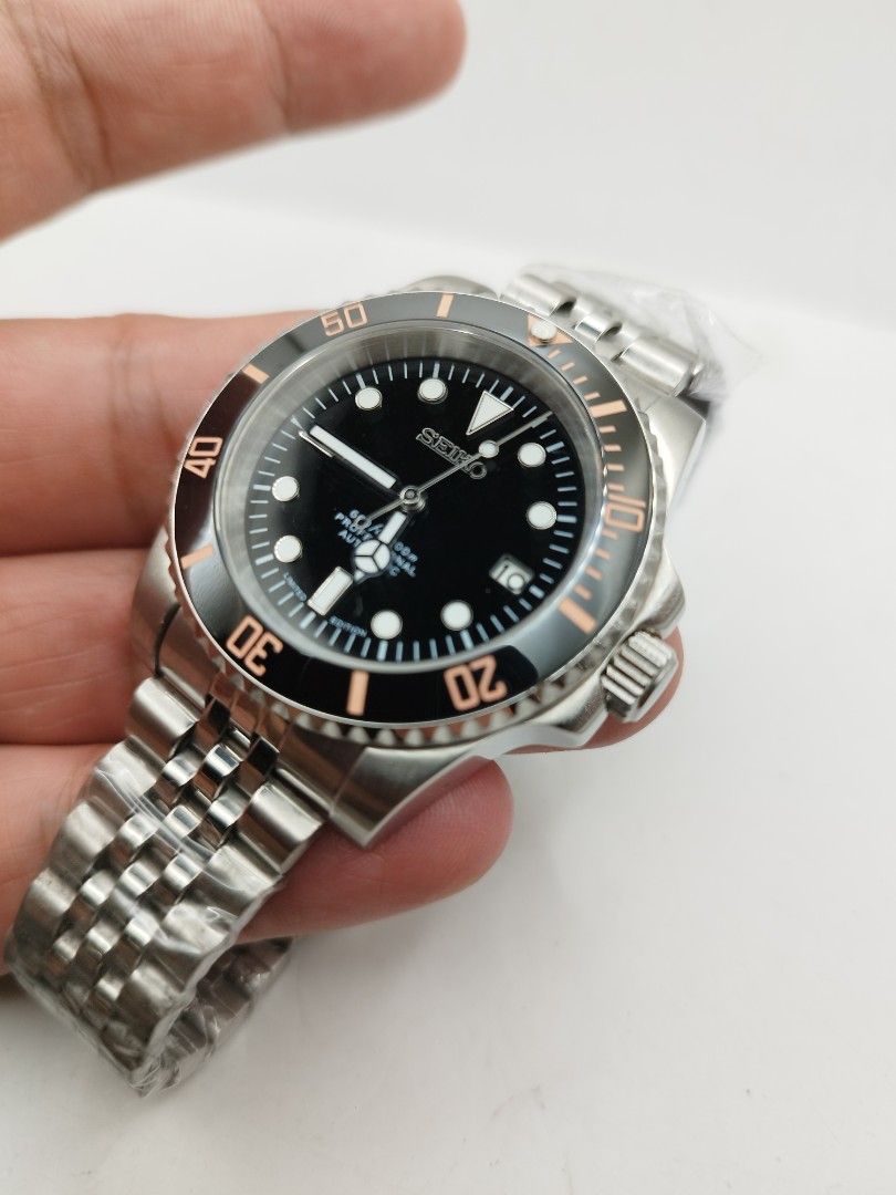 Seiko seikolex sub mod (Category: Men's Watches) located in Quezon City. Submitted by ars_watches (Listing ID 1465404564, Image 3). Description: original Seiko 7s26 movement 904L stainless steel aftermarket base dial hands 304L stainless steel aftermarket folded jubilee strap sapphire glass 40mm case dm in good running condition with box.