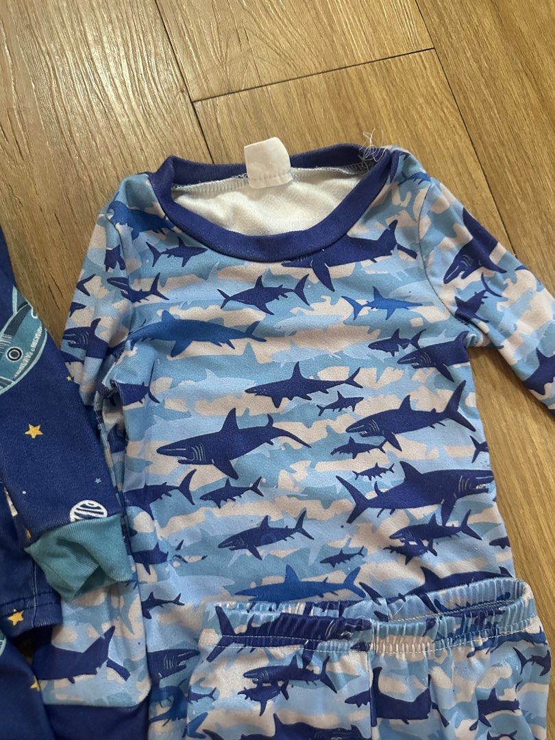 SHEIN PAJAMA SET BUNDLE (Category: Babies & Kids Fashion) located in Las Pinas. Submitted by petiteclothes_2000 (Listing ID 1465439297, Image 3). Description: - size 2T, ideal for 1-2yrs old - Lot of 3 matching toddler boys pajama sets - Size: 2T (Brand new with tags attached) - Designs: Dark blue rocket, light blue shark camo, and light blue dinosaur prints - Material: Super soft fabric with comfortable elastic waistbands - Ideal for everyday sl